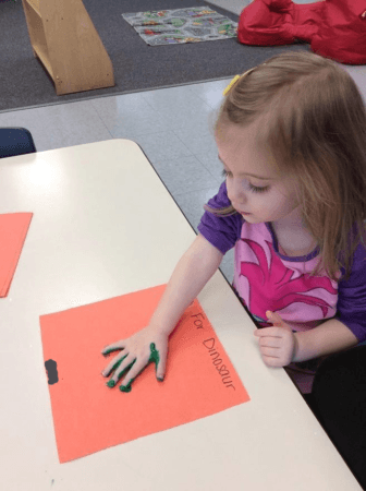 dinosaur_handprint_painting_activity_adventures_in_learning_naperville_il-336x450