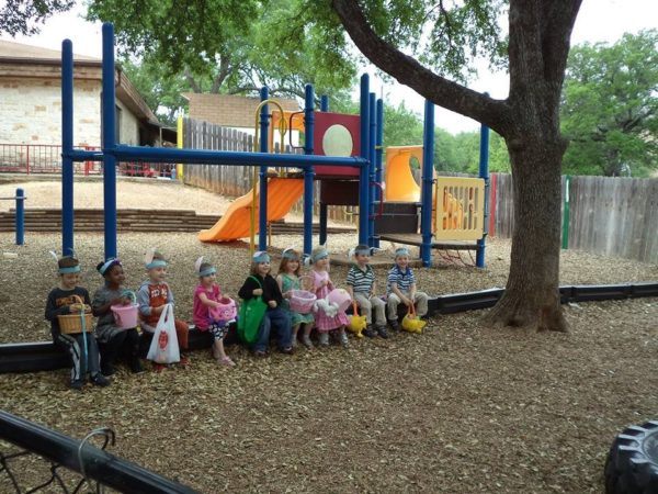 easter_egg_hunt_on_playground_at_cadence_academy_preschool_austin_tx-600x450