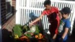 elementary_student_watering_flowers_prime_time_early_learning_centers_edgewater_nj-752x423