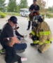 children learning from firefighters at school at preschool and daycare cadence academy preschool nolensville 504