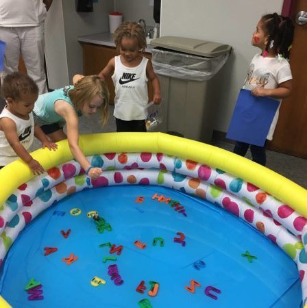 fishing_in_plastic_pool_rogys_learning_place_east_peoria_il-450x450