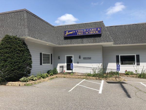 front_door_close_school_from_street_jonis_child_care_preschool_burlington_ct-600x450