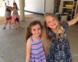 girls_being_silly_on_playground_at_cadence_academy_preschool_dupont_wa-565x450
