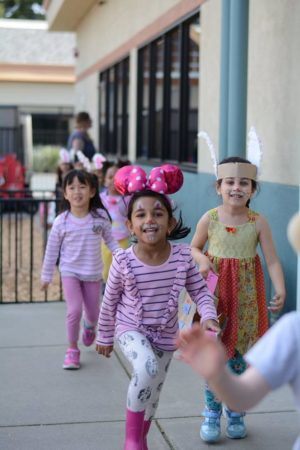 girls_playing_in_halloween_costumes_at_cadence_academy_preschool_prairie_city_folsom_ca-300x450