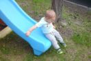 going_down_the_slide_at_prime_time_early_learning_centers_middletown_ny-666x450