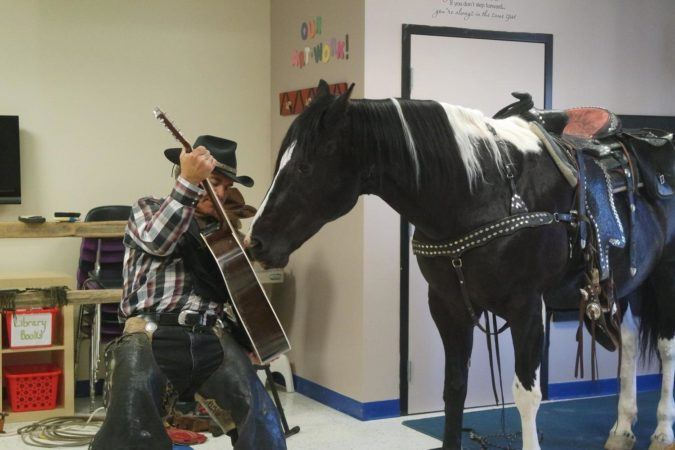 guest_cowboy_and_horse_performer_at_phoenix_childrens_academy_private_preschool_estrella_mountain_az-675x450