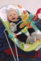 happy_infant_in_bouncer_prime_time_early_learning_centers_farmingdale_ny-298x450