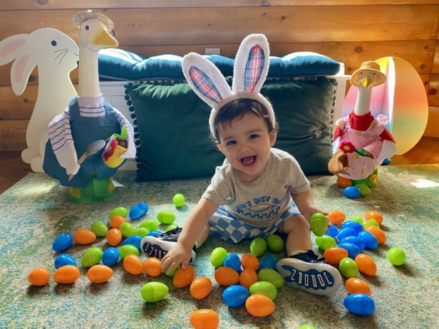 infant playing with easter eggs at cadence academy wylie texas