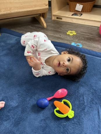 infant rolling over at preschool and daycare of 339 wild horse