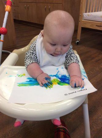 infant_finger_paint_at_cadence_academy_preschool_cypress_houston_tx-333x450