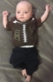 infant_in_football_outfit_creative_kids_childcare_centers_brewster-293x450
