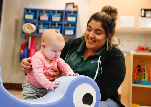 infant_playing_cadence_academy_north_aurora_il-634x450