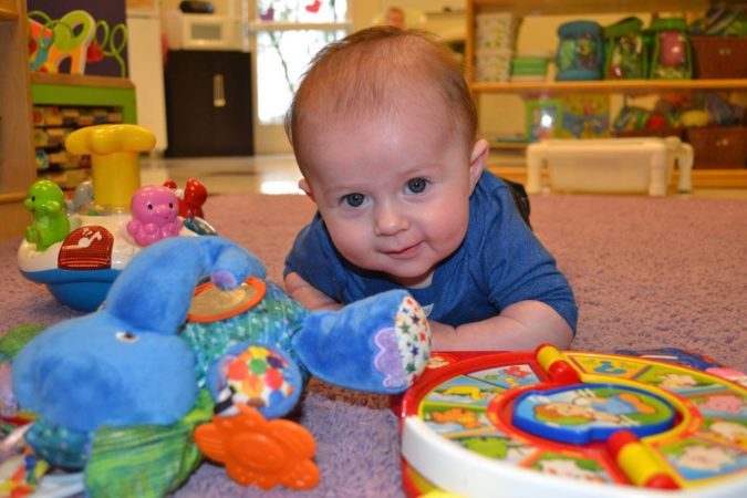 infant_tummy_time_at_phoenix_childrens_academy_private_preschool_estrella_mountain_az-675x450