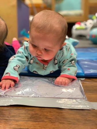 infant_tummy_time_bearfoot_lodge_private_school_wylie_tx-338x450