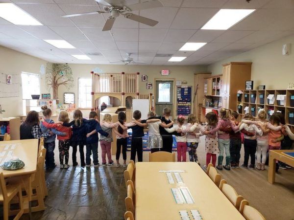 kind_child_group_hug_cadence_academy_preschool_childrens_center_klamath_falls_or-600x450