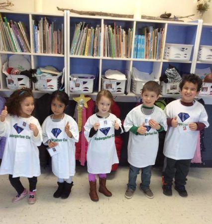 kindergarten_club_students_showing_off_their_nametags_winwood_childrens_center_ashburn_va-426x450