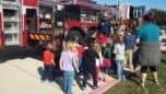 learning_about_the_equipement_on_a_fire_truck_at_cadence_academy_preschool_flower_mound_tx-752x423