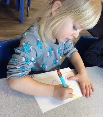 letter_writing_activity-cadence_academy_preschool_main_street_normal_il-398x450