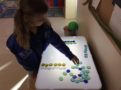 light_box_bead_game_smaller_scholars_montessori_academy_gilbert_az-605x450