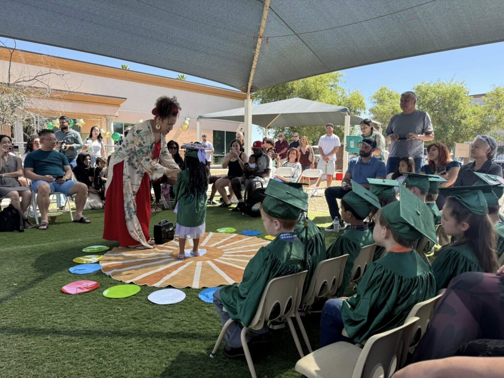 male and female children graduating preschool at cadence academy preschool