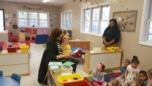 mom_reading_to_2-year-olds_at_cadence_academy_raintree_charlotte_nc-1024x576-752x423