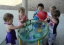 outside_water_play_at_cadence_academy_preschool_louisville_ky-636x450