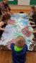 painting_with_colored_shaving_cream_miss_muffets_learning_center_klamath_falls_or-253x450