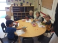 painting_with_dinosaurs_activity_at_phoenix_childrens_academy_private_preschool_chandler_dobson-605x450