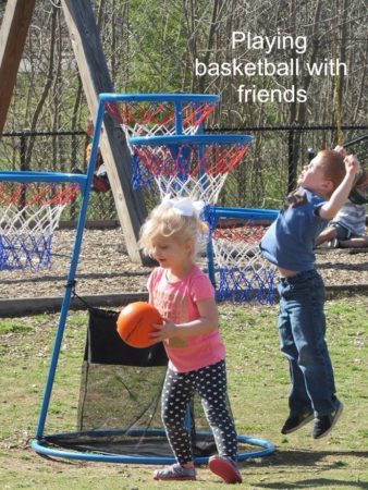 playing_basketball_with_friends_cadence_academy_preschool_fayetteville_ar-338x450