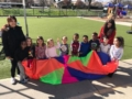 playing_with_parachute_at_the_phoenix_schools_private_preschool_antelope_ca-600x450