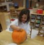 playing_with_pumpkin_at_phoenix_childrens_academy_private_preschool_thunderbird-444x450