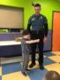 police_officer_arresting_preschooler_creative_expressions_learning_center_eureka_mo-338x450