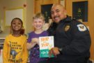 policeman_reading_hop_on_pop_sunbrook_academy_at_stilesboro_kennesaw_ga-675x450