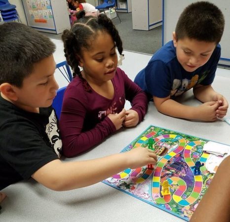 pre-kindergarten_children_playing_candy_land_cadence_academy_preschool_north_aurora_il-466x450