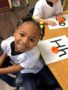 pre-kindergarten_girl_learning_letters_the_bridge_learning_center_carrollton_ga-338x450