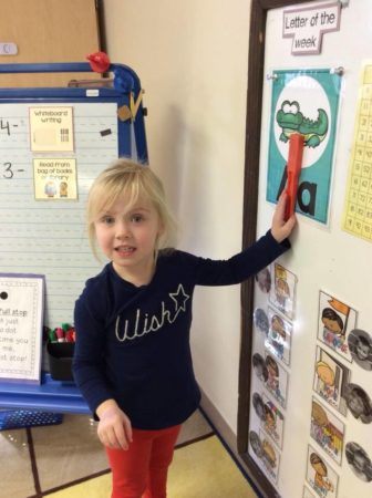 pre-kindergarten_girl_pointing_out_the_letter_of_the_week_cadence_academy_preschool_chesterfield_hilltown_mo-336x450