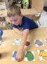 pre_kindergarten_boy_doing_a_number_activity_cadence_academy_preschool_chesterfield_hilltown_mo-336x450