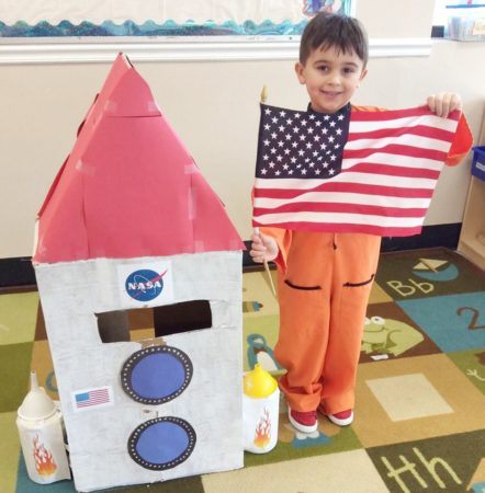 preschool_astronaut_with_american_flag_cadence_academy_preschool_myrtle_beach_sc-442x450