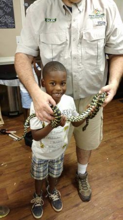 preschool_boy_and_snake_sunbrook_academy_at_stockbridge_ga-253x450