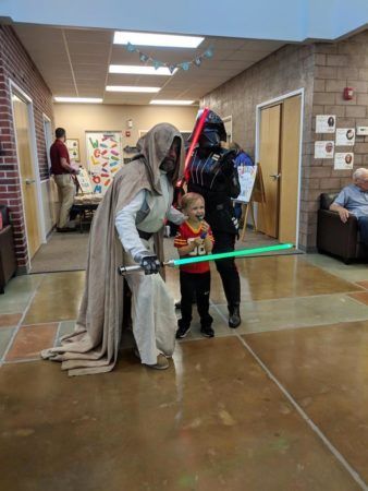 preschool_boy_being_protected_by_the_force_halloween_canterbury_academy_at_prairie_ridge_olathe_ks-338x450