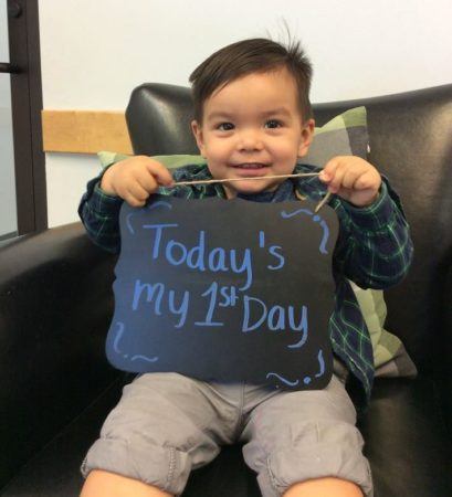 preschool_boy_celebrating_1st_day_adventures_in_learning_aurora_il-409x450