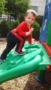 preschool_boy_climbing_on_playground_equipment_prime_time_early_learning_centers_paramus_nj-253x450
