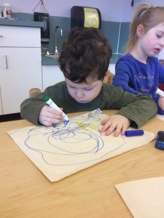 preschool_boy_coloring_with_marker_cadence_academy_preschool_hanover_ma-338x450