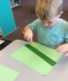 preschool_boy_drawing_lines_with_ruler_cadence_academy_preschool_seekonk_ma-379x450