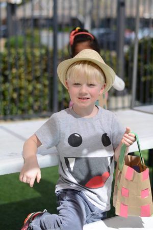 preschool_boy_during_easter_egg_hunt_at_cadence_academy_preschool_prairie_city_folsom_ca-300x450