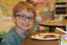 preschool_boy_eating_healthy_breakfast_learning_edge_childcare_and_preschool_oak_creek_wi-676x450