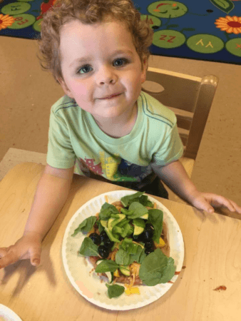 preschool_boy_eating_healthy_lunch_cadence_academy_preschool_milwaukie_portland_or-338x450