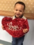 preschool_boy_holding_heart_at_next_generation_childrens_centers_andover_ma-338x450