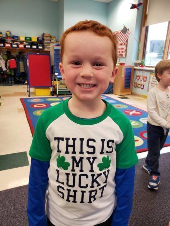 preschool_boy_in_lucky_st_patricks_day_t-shirt_learning_edge_childcare_and_preschool_new_berlin_wi-338x450