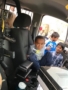 preschool boy in police van